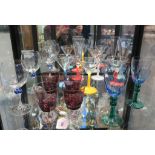 Drinking glasses: Pair of wine glasses with blue bowls and green knopped stems 17cm, three wine