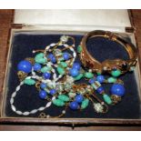 Two gem set Oriental necklaces together with a stone set bangle