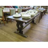 An oak refectory table, on baluster shaped fret carved supports and bracket feet, 77.5cm wide