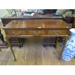 A crossbanded walnut side table, with three frieze drawers and moulded apron on cabriole legs and