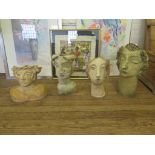 Four terracotta plant pots in the form of portrait busts, largest 55cm high (4)