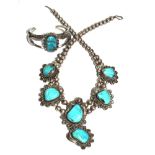 A collection of silver and turquoise jewellery to include a necklace and matching bangle