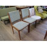 An upholstered nursing chair, with pink striped upholstery and cabriole legs