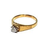 A 9 carat gold single stone ring