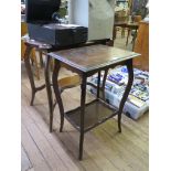 An Edwardian walnut window table with shaped top and cabriole legs joined by an undershelf 71cm wide