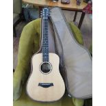 A Taylor small size acoustic guitar, model no.BT1
