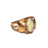 An Arts and Crafts gold ring set in opal