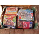 A box of vintage jigsaws