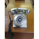 A chrome effect telephone