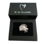 A K di Kuore white gold ring set with white and black diamonds