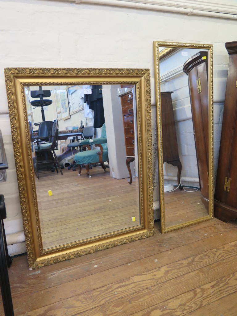 Two giltwood framed wall mirrors 92cm x 69cm and 105cm x 39cm (2)