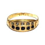 A diamond and sapphire ring set in 18 carat gold