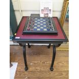 "The Battle of Waterloo" chess set, by the Franklin Mint on a Regency style stand, with