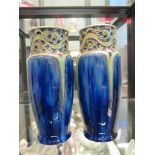 A pair of Royal Doulton vases designed by Francis C. Pope, flambe blue with incised and pigment
