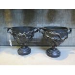 A pair of 19th century bronze urns, with all over ivy design, 18.5cm high