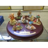 A collection of centenary edition Beatrix Potter resin figures, issue limited to 9,500, some set