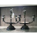 A 19th century pair of bronze candelabras, Etruscan revival style, 24cm high