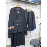 A British Airways pilots jacket, a blazer with epaulettes, a BEA overcoat, and a white shirt with