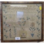 An early Victorian sampler, initialled C.A. with alphabet and numbers, vase of flowers, birds and