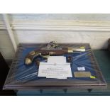 A reproduction Napoleon flintlock pistol, by the Franklin Mint, with display frame and certificate