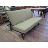 A1960s stained beech Danish settee, stamped France and Deverkosen, Stockholm with green loose covers
