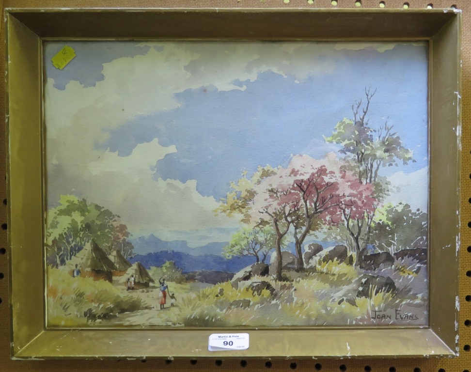 Joan Evans Figures in an African village landscape Watercolour, signed 29cm x 38cm