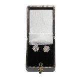 A pair of diamond earrings