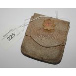 A World War II national fire service badge and wallet with warrant