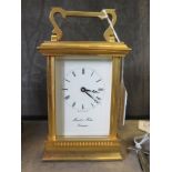 A brass carriage clock time piece, retailed by Morrell and Hilton, Huntingdon, 15.5 cm high