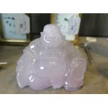 A lavender jade carving of Hotei, 10.5cm wide