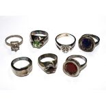 A collection of seven silver rings