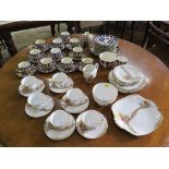 A Royal Stafford gardens design part tea service, 27 pieces and an Aynsley and others Imari