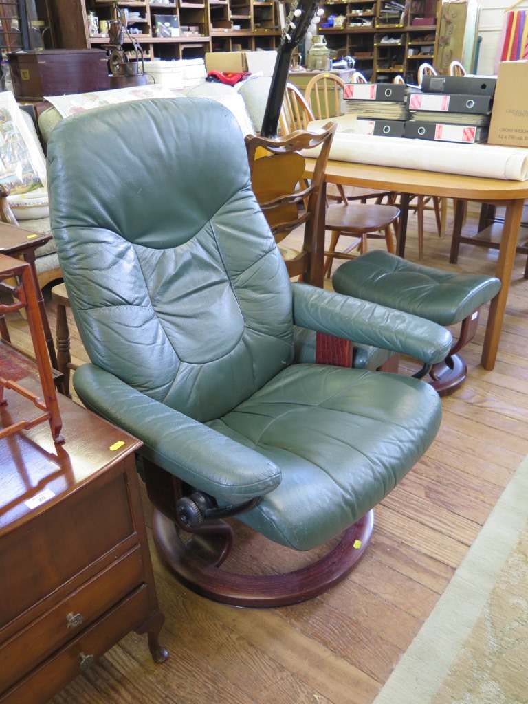 A green leather easy armchair and two footstools (3)