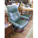 A green leather easy armchair and two footstools (3)