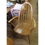 A set of four Ercol Windsor Quaker dining chairs, including two carvers, and two other Ercol