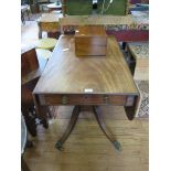 A Regency mahogany Pembroke table, with frieze drawer over flat supports on reeded downswept legs