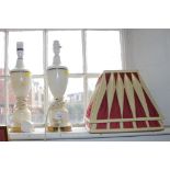 A pair of white hardstone vase shape table lamps, 30cm high and a brass desk lamp (3)