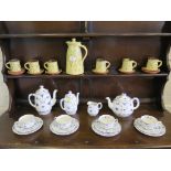 A Furnivals and Masons Denmark pattern part tea service, and slip ware coffee service with leaf