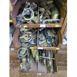 A collection of horse brasses, brass figures and other assorted brassware