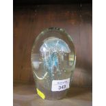 A large hand blown glass turquoise blue jellyfish paperweight