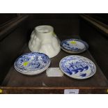 An English 18th century blue and white 'Chinese House' pattern saucer 12.5cm diameter, a Chinese