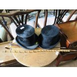 A gentleman's top hat by Jolliffe, size 7, another top hat, two canes and a riding crop (5)