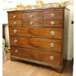 An early 19th century mahogany chest of drawers, possibly Scottish, with an arrangement of two