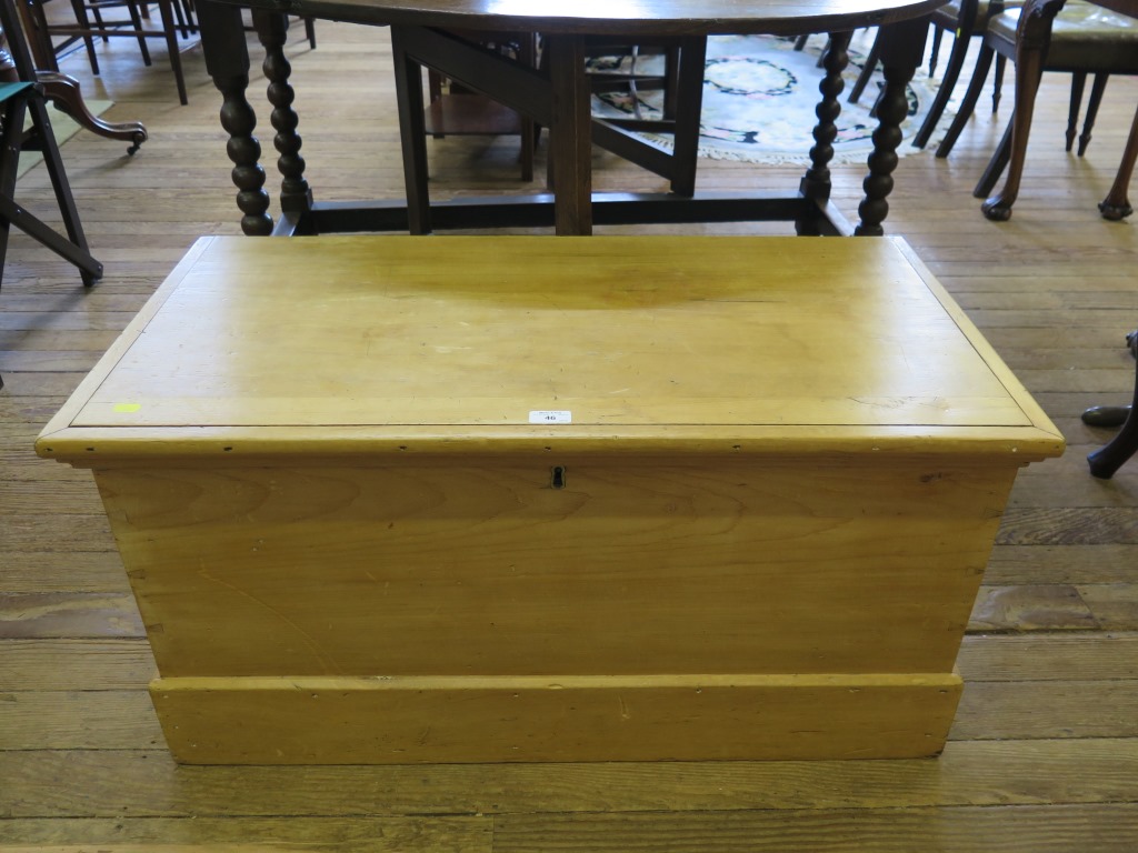 A pine blanket box, with swing handles and candle box 92cm wide