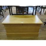 A pine blanket box, with swing handles and candle box 92cm wide