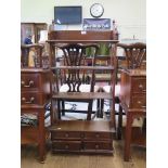 A mahogany fret carved wall shelf, the four shelves over four short drawers 54cm wide, 113cm high