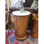 A Victorian mahogany cylindrical pot cupboard, with marble top, single door and plinth base 72cm