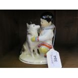 A Lomonosov Russian porcelain Yakut Eskimo/Inuit boy and husky dog model