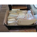 A large quantity of stamped envelopes in two boxes