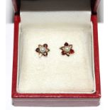 A pair of garnet and pearl earrings